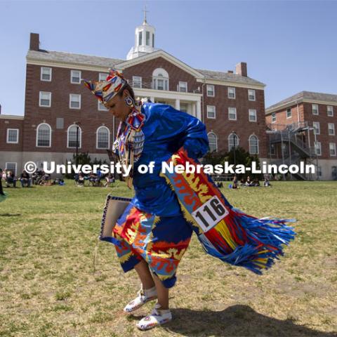 Bridget Morris performs a traditional dance during the April 23 powwow. 2022 UNITE powwow to honor graduates (K through college). Held April 23 on the greenspace along 17th Street, immediately west of the Willa Cather Dining Center. This was UNITE’s first powwow in three years. The MC was Craig Cleveland Jr. Arena director was Mike Wolfe Sr. Host Northern Drum was Standing Horse. Host Southern Drum was Omaha White Tail. Head Woman Dancer was Kaira Wolfe. Head Man Dancer was Scott Aldrich. Special contest was a Potato Dance. April 23, 2023. Photo by Troy Fedderson / University Communication.